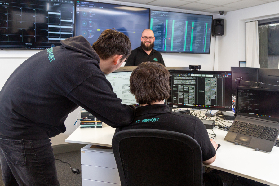 EIDI_Staff_Working_IT_Support